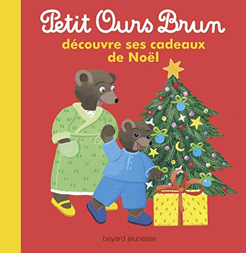 Petit Ours Brun découvre ses cadeaux de Noël
